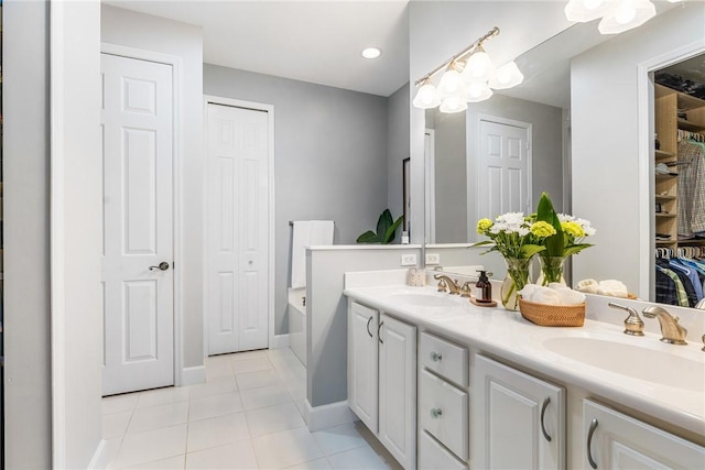 bathroom featuring tile patterned floors and vanity