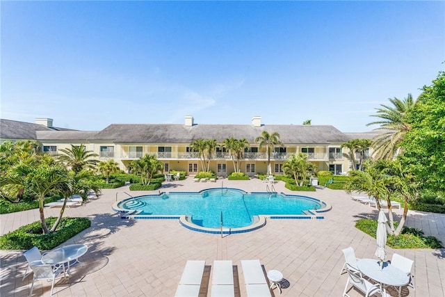community pool featuring a patio