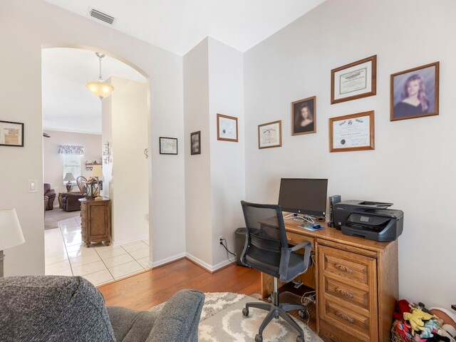 office area featuring light hardwood / wood-style floors