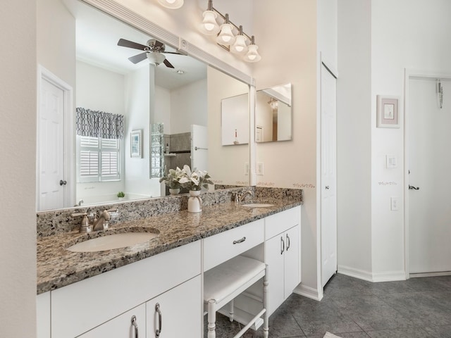 bathroom featuring vanity, ceiling fan, and tile patterned flooring