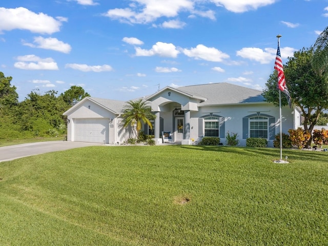 ranch-style house featuring a garage and a front yard