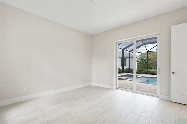 empty room featuring light hardwood / wood-style floors