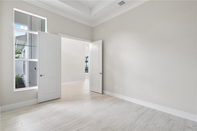 spare room featuring light hardwood / wood-style floors