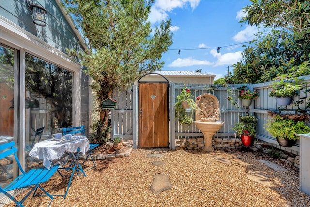 exterior space featuring a storage shed