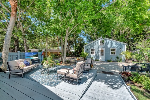 wooden deck featuring an outdoor hangout area