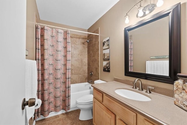 full bathroom with tile patterned flooring, toilet, vanity, and shower / bath combo with shower curtain