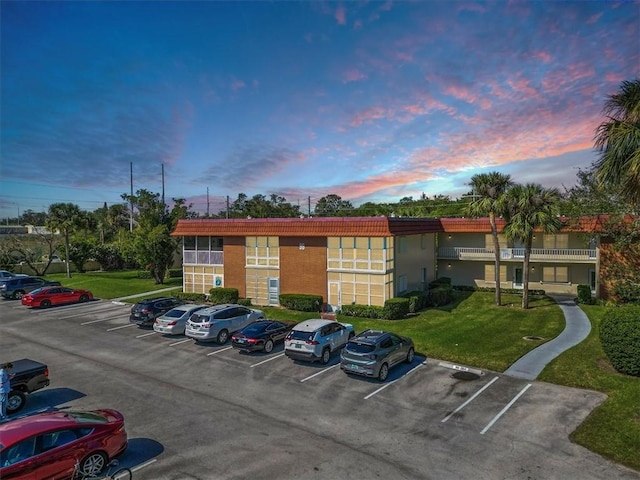 view of outdoor building at dusk