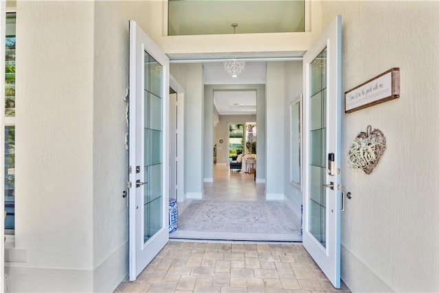 doorway to property with french doors