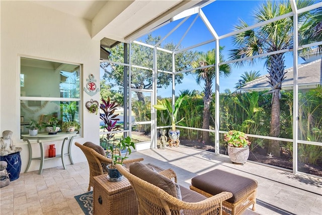 sunroom / solarium featuring a pool