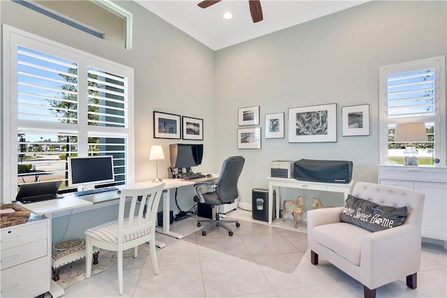 tiled office featuring ceiling fan