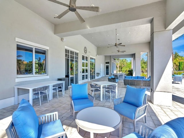 9215 Orchid Cove Cir, Vero Beach, FL 32963 - view of patio featuring outdoor lounge area, a ceiling fan, outdoor dining space, and french doors