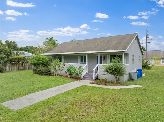 view of front facade featuring a porch and a front lawn