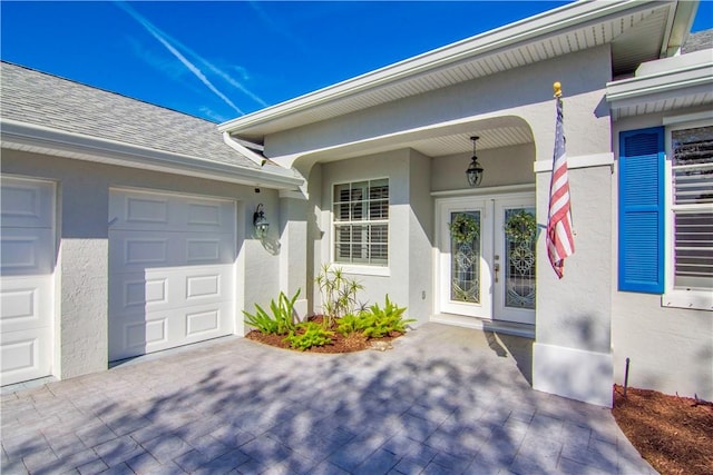 property entrance featuring a garage