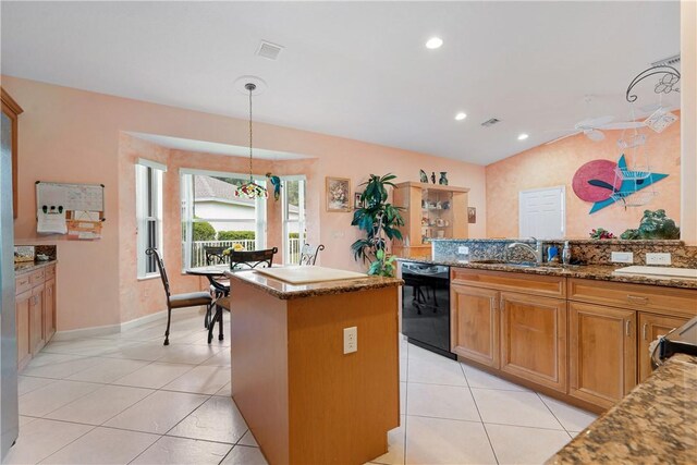 3255 W Brookfield Way, Vero Beach, FL 32966 - kitchen featuring black dishwasher, a sink, light tile patterned flooring, stone counters, and a center island