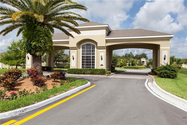 3255 W Brookfield Way, Vero Beach, FL 32966 - view of asphalt road featuring curbs