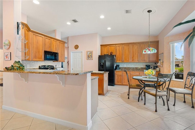 3255 W Brookfield Way, Vero Beach, FL 32966 - kitchen featuring black appliances, a peninsula, decorative backsplash, light stone countertops, and recessed lighting