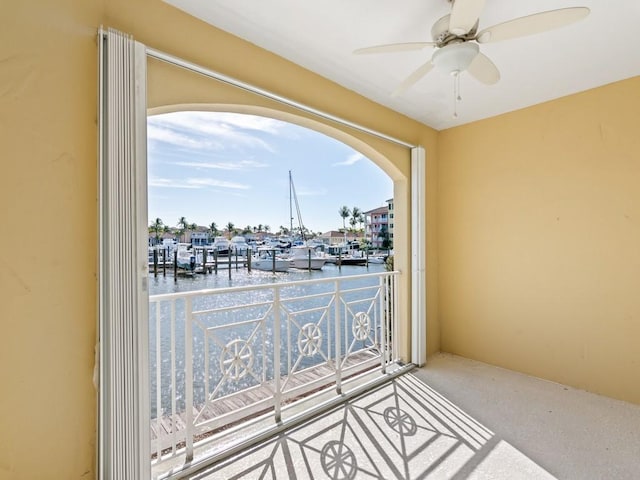 5540 N Harbor Village Dr Unit 103, Vero Beach, FL 32967 - balcony featuring a water view and a ceiling fan