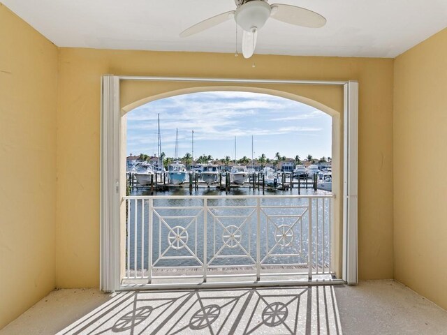 5540 N Harbor Village Dr Unit 103, Vero Beach, FL 32967 - balcony featuring a water view and a ceiling fan