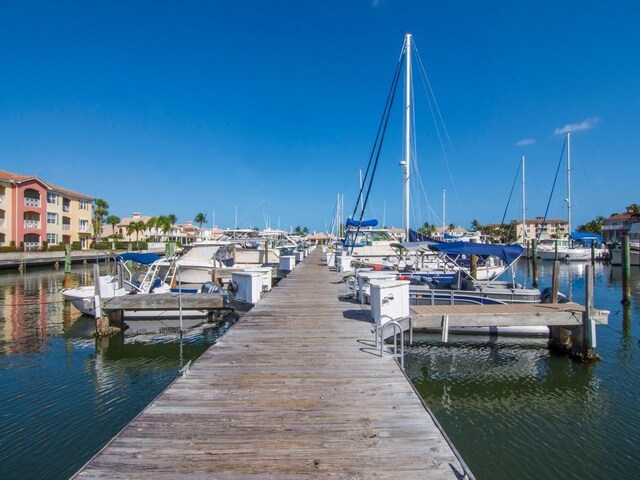 5540 N Harbor Village Dr Unit 103, Vero Beach, FL 32967 - dock featuring a water view