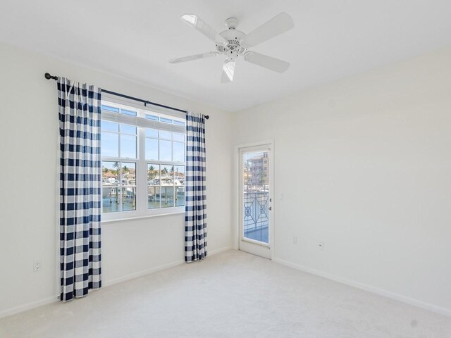 5540 N Harbor Village Dr Unit 103, Vero Beach, FL 32967 - unfurnished room with carpet floors and ceiling fan