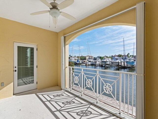 5540 N Harbor Village Dr Unit 103, Vero Beach, FL 32967 - balcony with a water view and ceiling fan