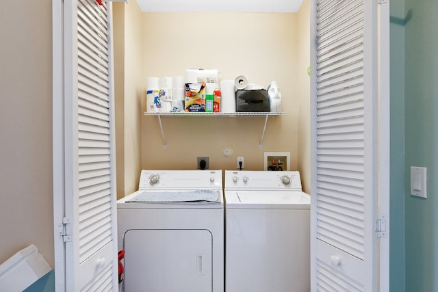 laundry area featuring washing machine and dryer