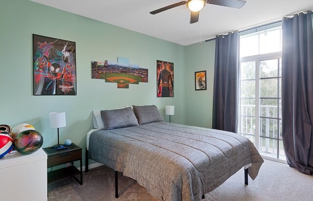 bedroom featuring access to outside, carpet, and ceiling fan