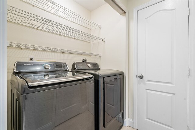 laundry room featuring washer and dryer