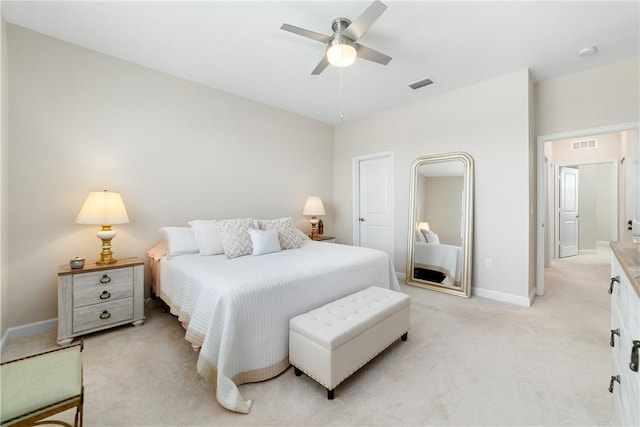 10134 W Villa Cir, Vero Beach, FL 32966 - bedroom with light colored carpet, baseboards, and ceiling fan