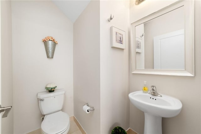10134 W Villa Cir, Vero Beach, FL 32966 - bathroom featuring toilet and lofted ceiling