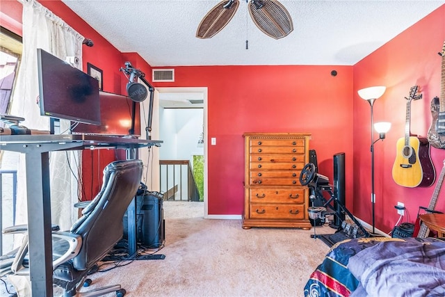 bedroom with baseboards, visible vents, a textured ceiling, and light colored carpet