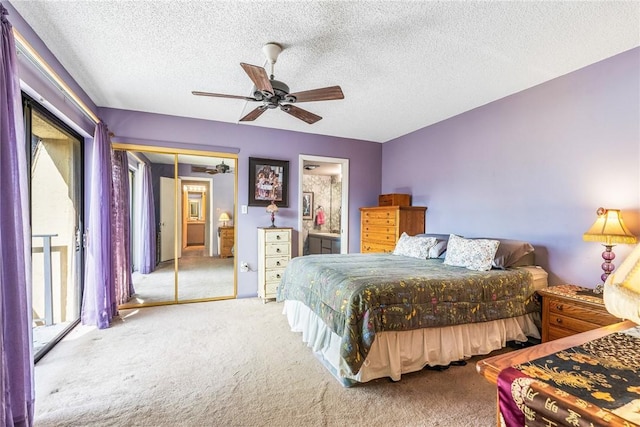 1170 6th Ave Unit 10A, Vero Beach, FL 32960 - bedroom with carpet flooring, a textured ceiling, ceiling fan, and connected bathroom