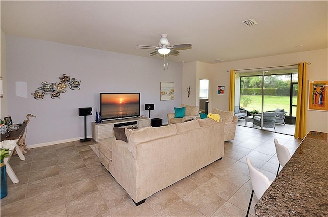 living room with ceiling fan