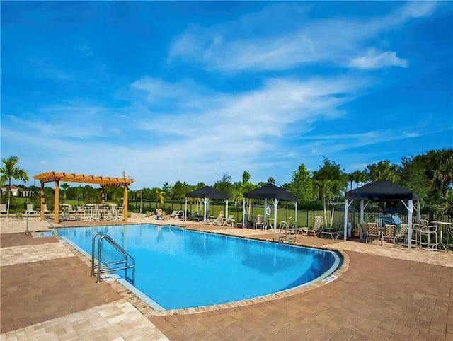 view of pool featuring a gazebo and a patio area