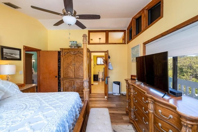 bedroom with light wood finished floors, baseboards, and ceiling fan