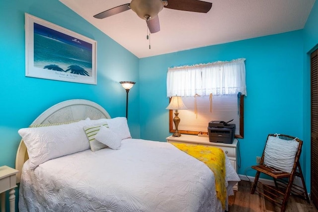 bedroom with wood finished floors and ceiling fan
