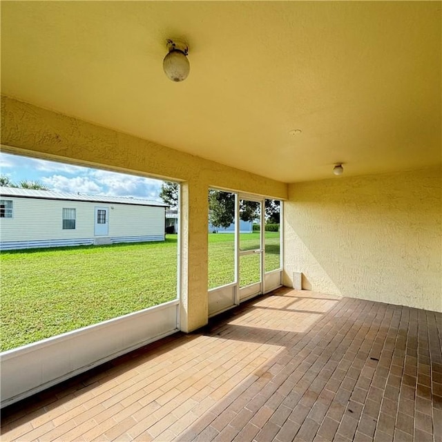 view of unfurnished sunroom