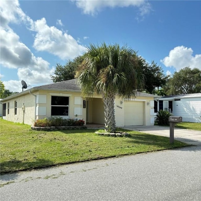 ranch-style home with stucco siding, concrete driveway, a garage, and a front yard