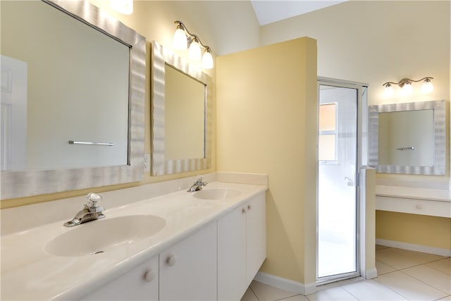 bathroom with tile patterned floors and vanity