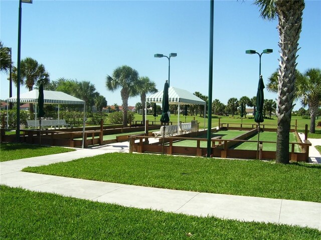 view of community featuring a lawn and a gazebo