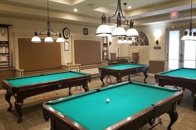 recreation room featuring carpet flooring, a raised ceiling, ornamental molding, and billiards