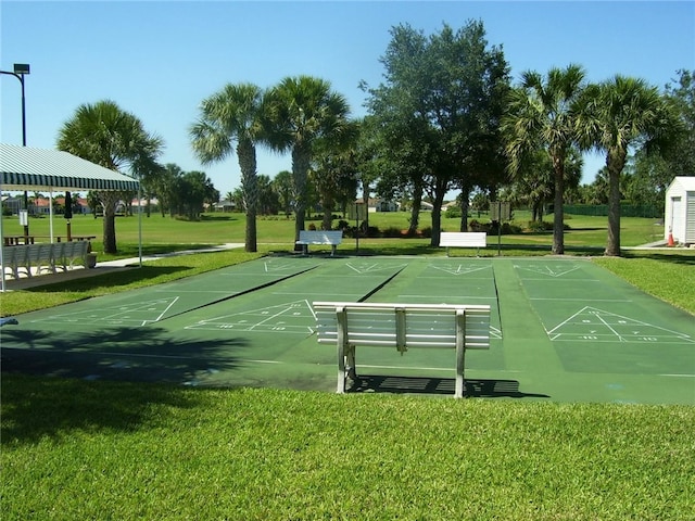 view of community featuring a yard