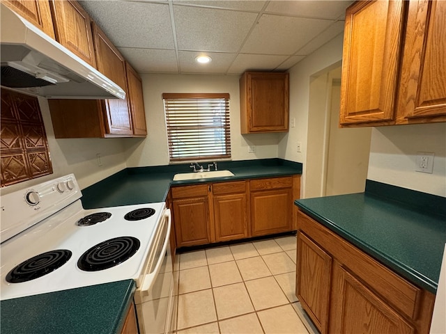 kitchen with light tile patterned floors, sink, a drop ceiling, and white electric stove