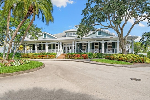 view of property with concrete driveway