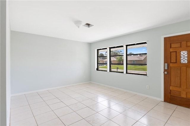 view of tiled spare room