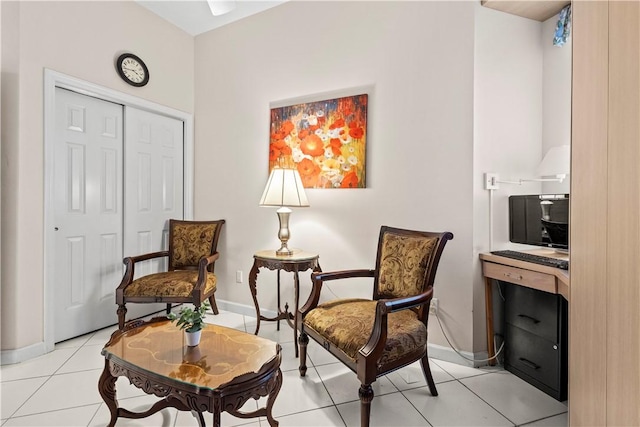 sitting room with light tile patterned floors