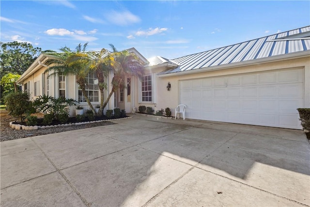 ranch-style home with a garage