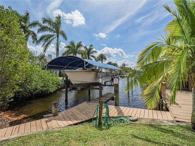 view of dock with a water view and boat lift