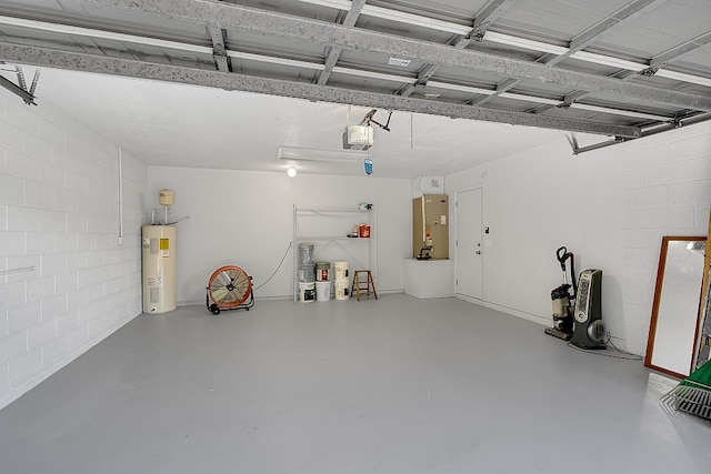 garage featuring water heater and a garage door opener