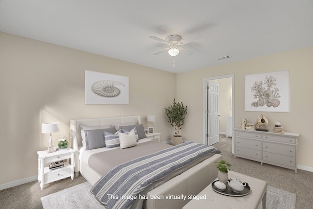 bedroom with ceiling fan and carpet